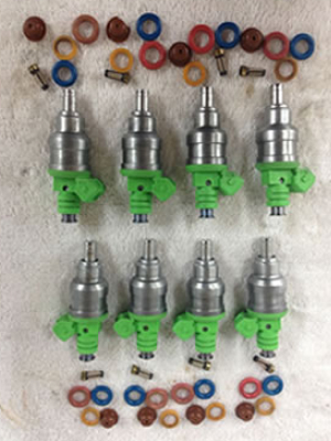 Various parts of a Bosch EV1 fuel injector